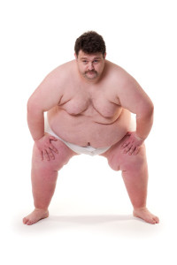 Big fat man in sumo pose.